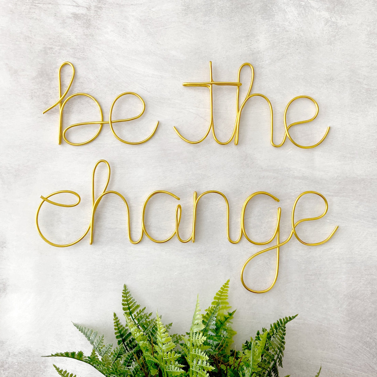 Be The Change Wire Sign