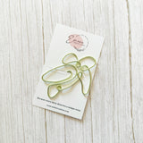 Wire turtle bookmark on a branded card.
